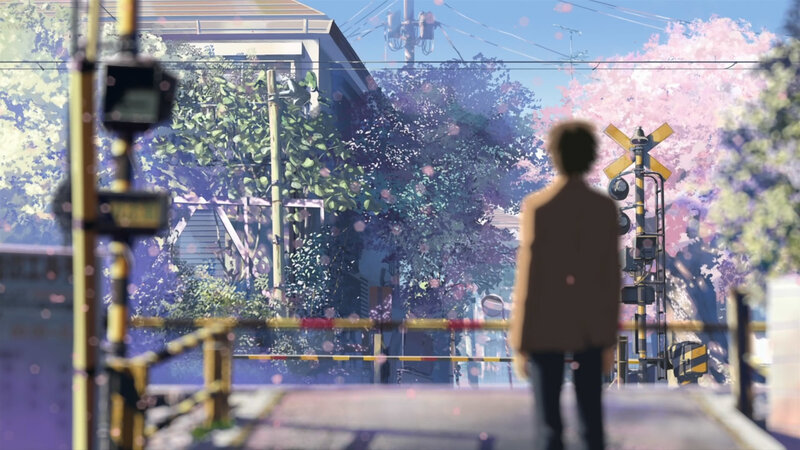person at train crossing
