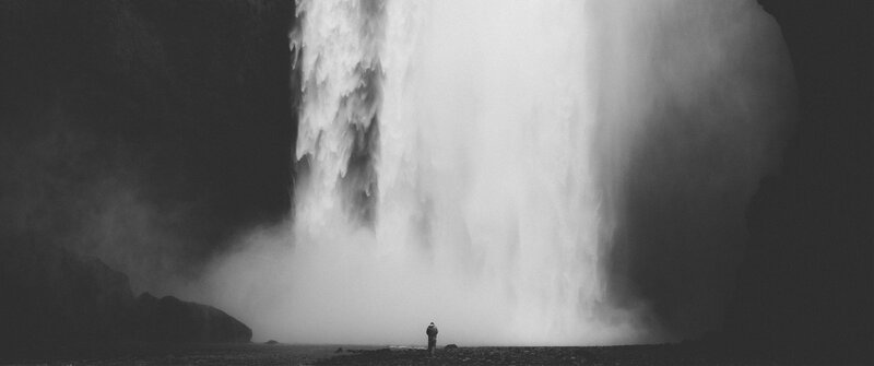 Person at Waterfall — Black, Dramatic, Photograph