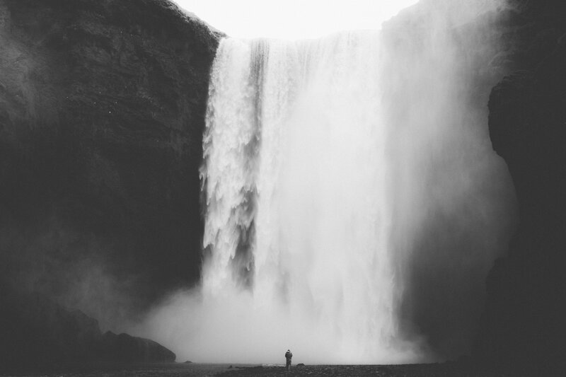 Person at Waterfall — Black