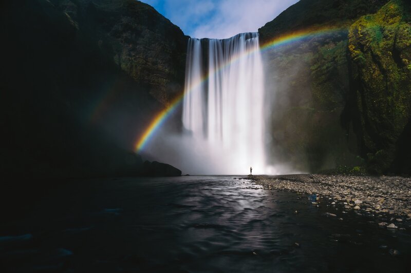 Person at Waterfall — Blue, Dramatic, Afternoon