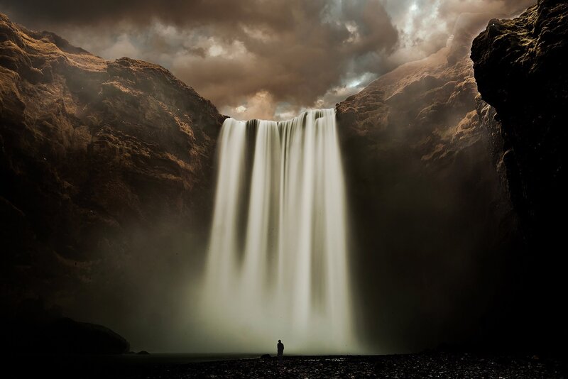 Person at Waterfall — Brown, Dramatic, Night