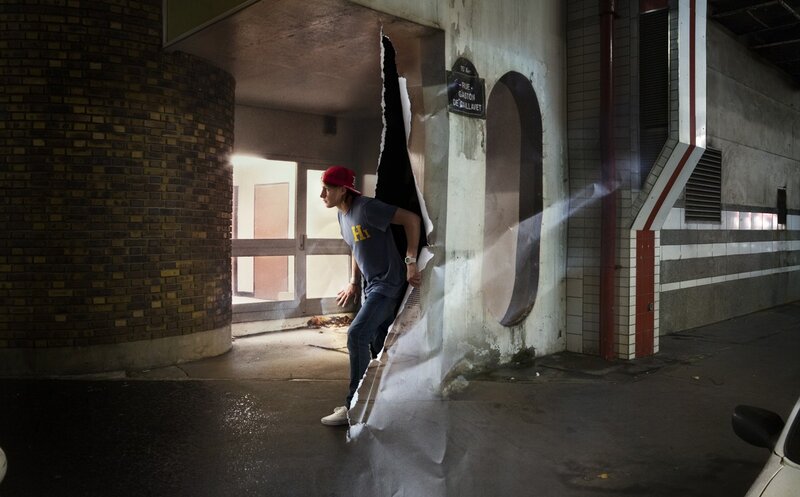 Person breaking through wall
