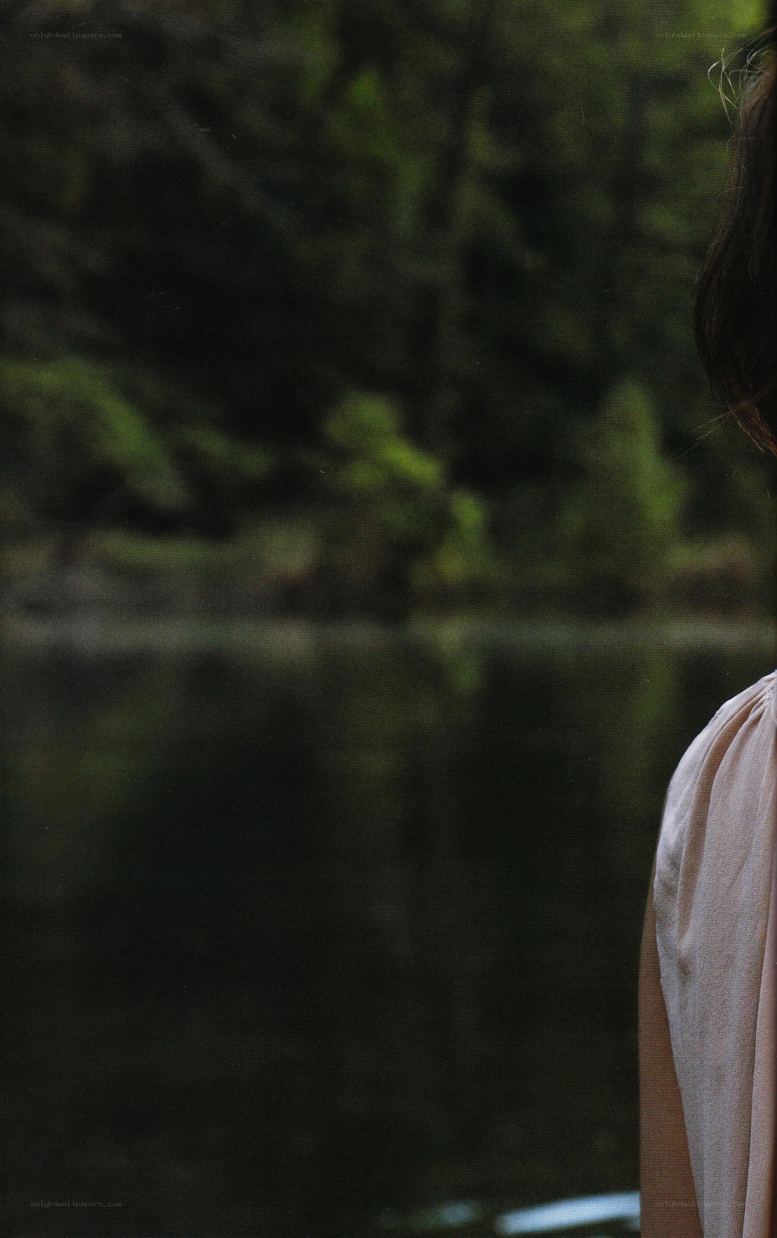 person by a lake