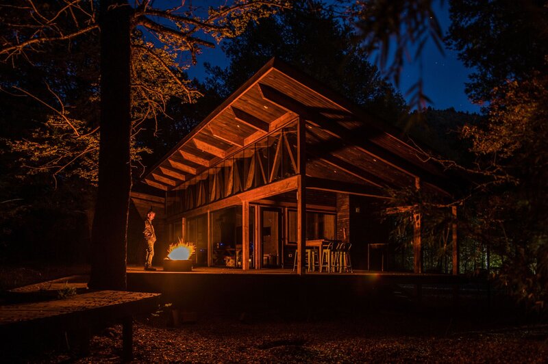 Person by Fire at Cabin
