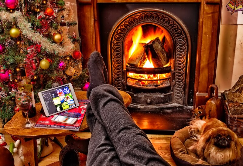 Person by Fireplace
