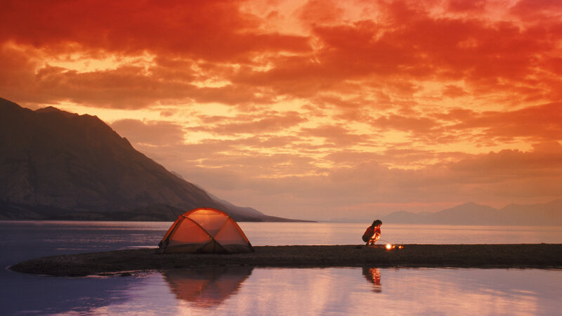 Person Camping by Lake