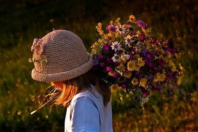 Person Carrying Flowers