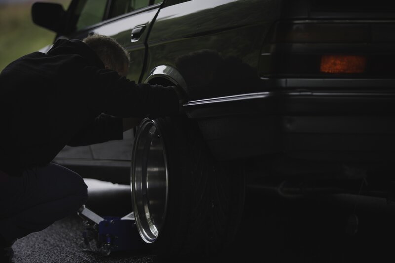 Person Changing Tire