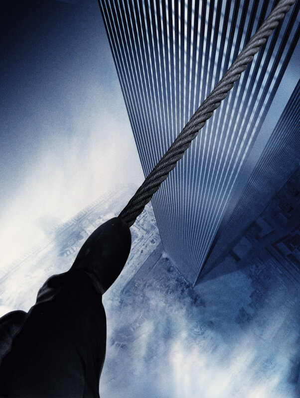 Person climbing skyscraper rope