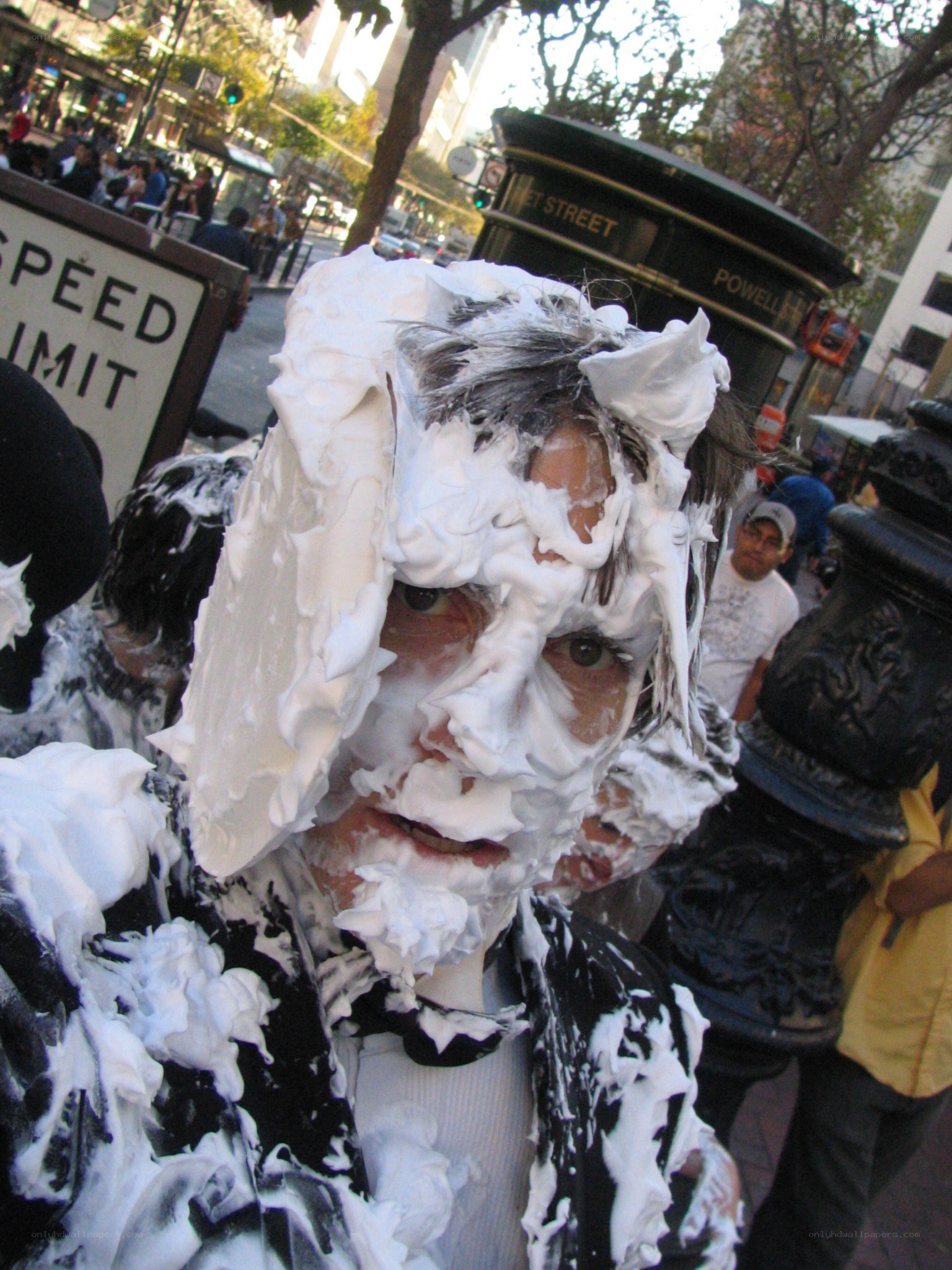 person covered in shaving cream