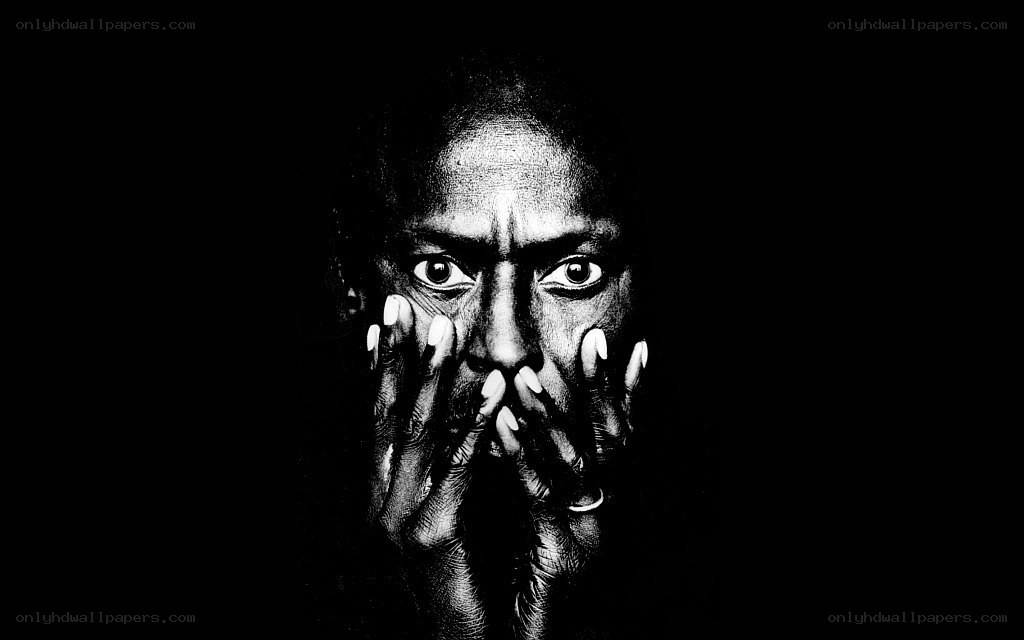 person covering face with hands
