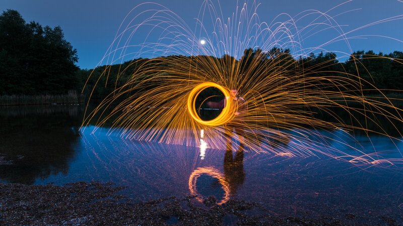 Person Creating Light Circle