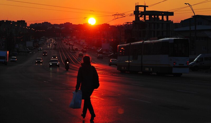 Person Crossing Street — Orange