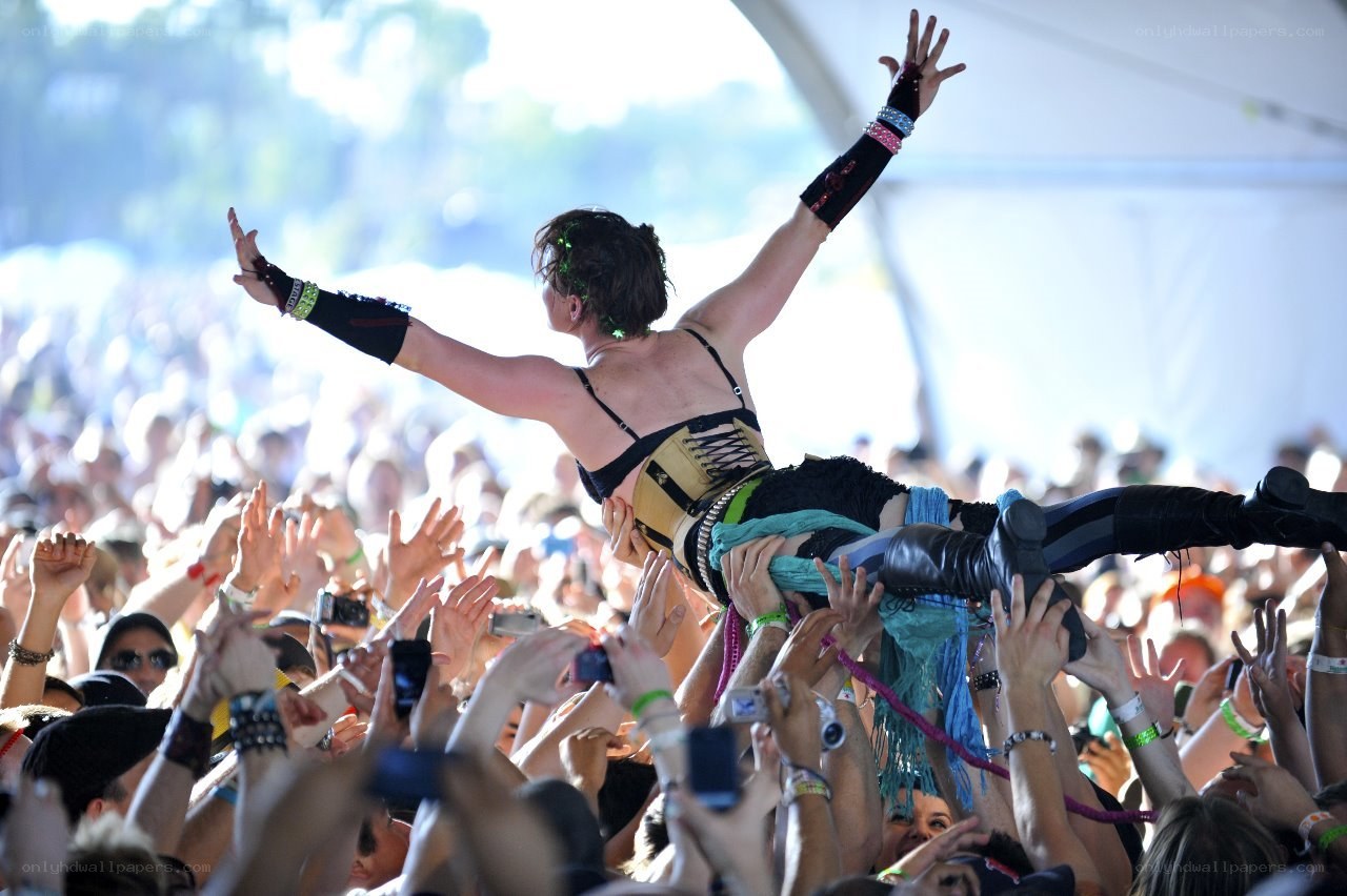 Person crowd-surfing at concert