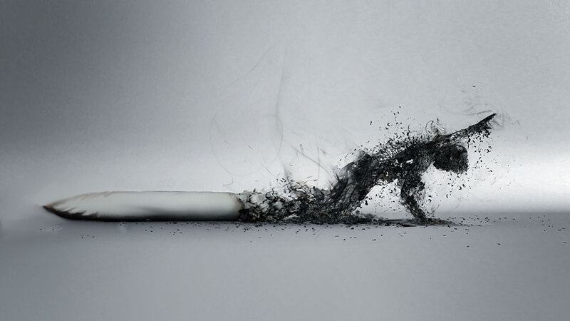 person dissolving into smoke
