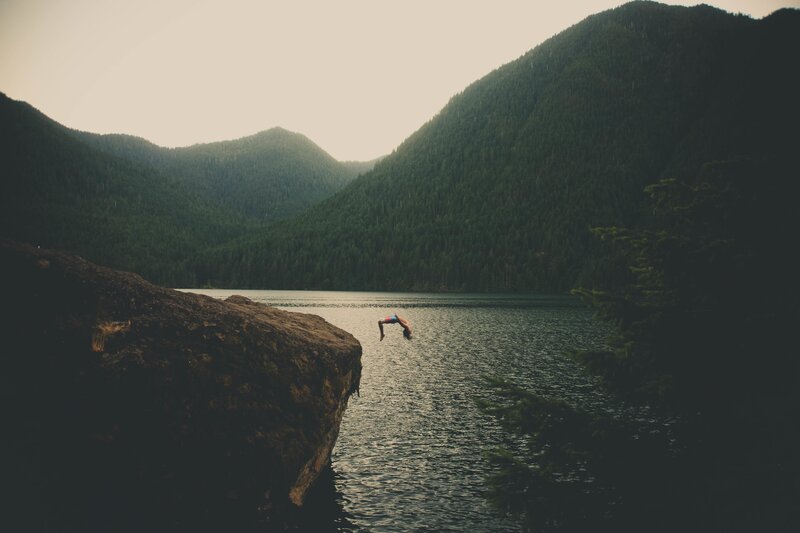 Person Diving into Lake