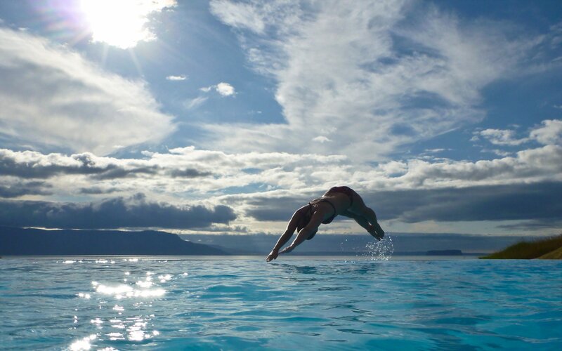 Person diving into pool