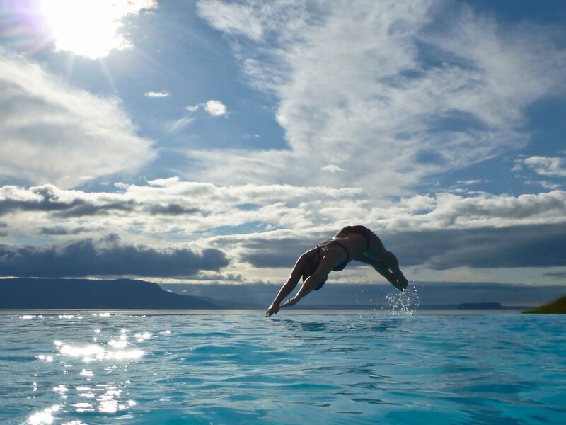 Person Diving into Water — Blue