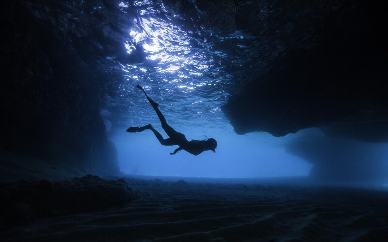 Person Diving Underwater — Blue, Serene
