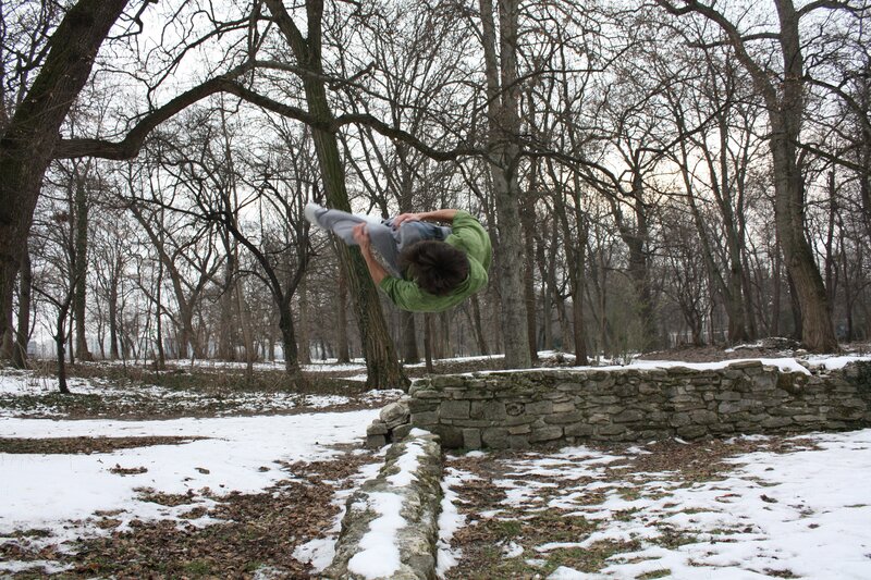 Person doing acrobatic flip