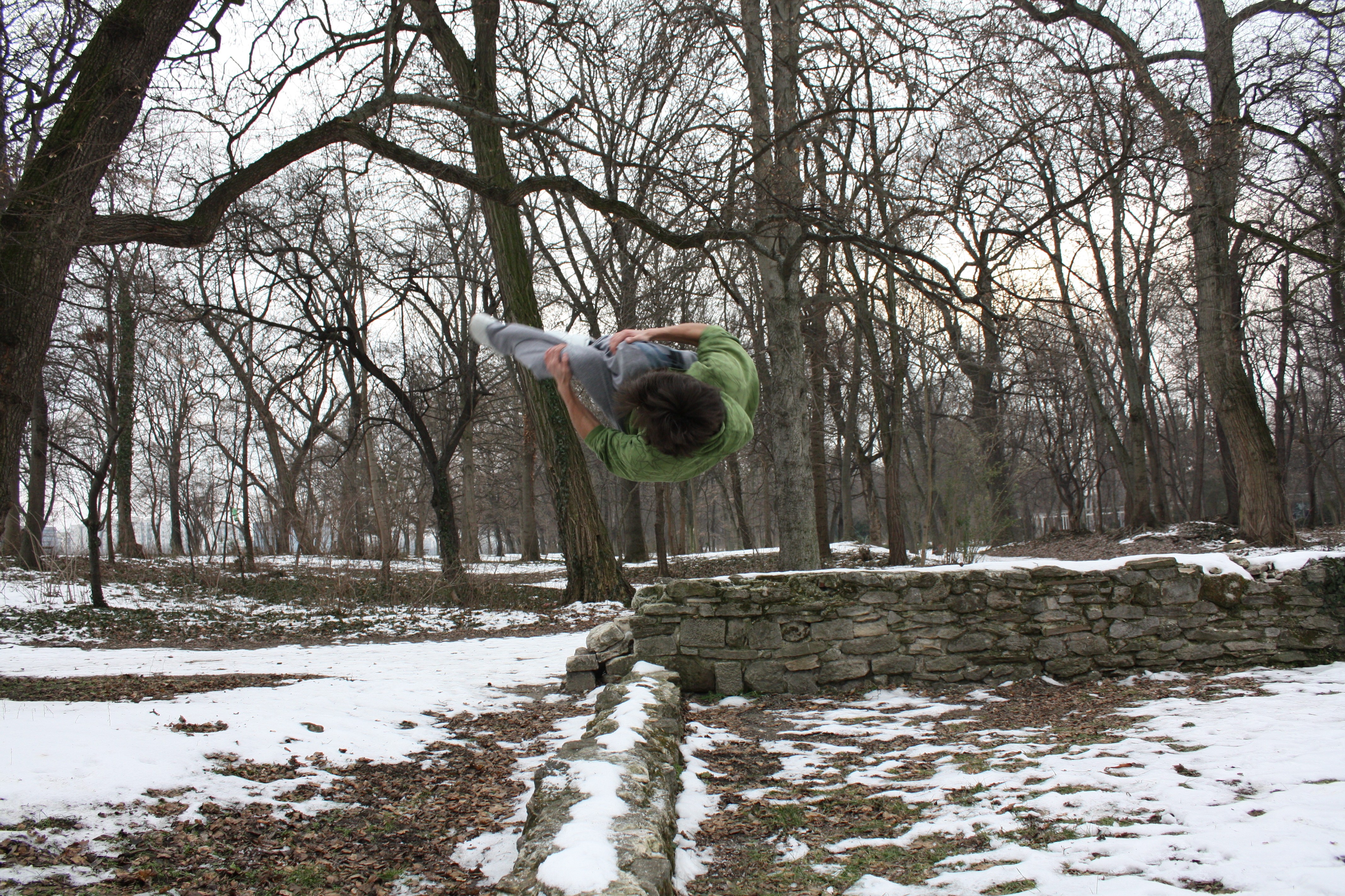 Person doing acrobatic flip