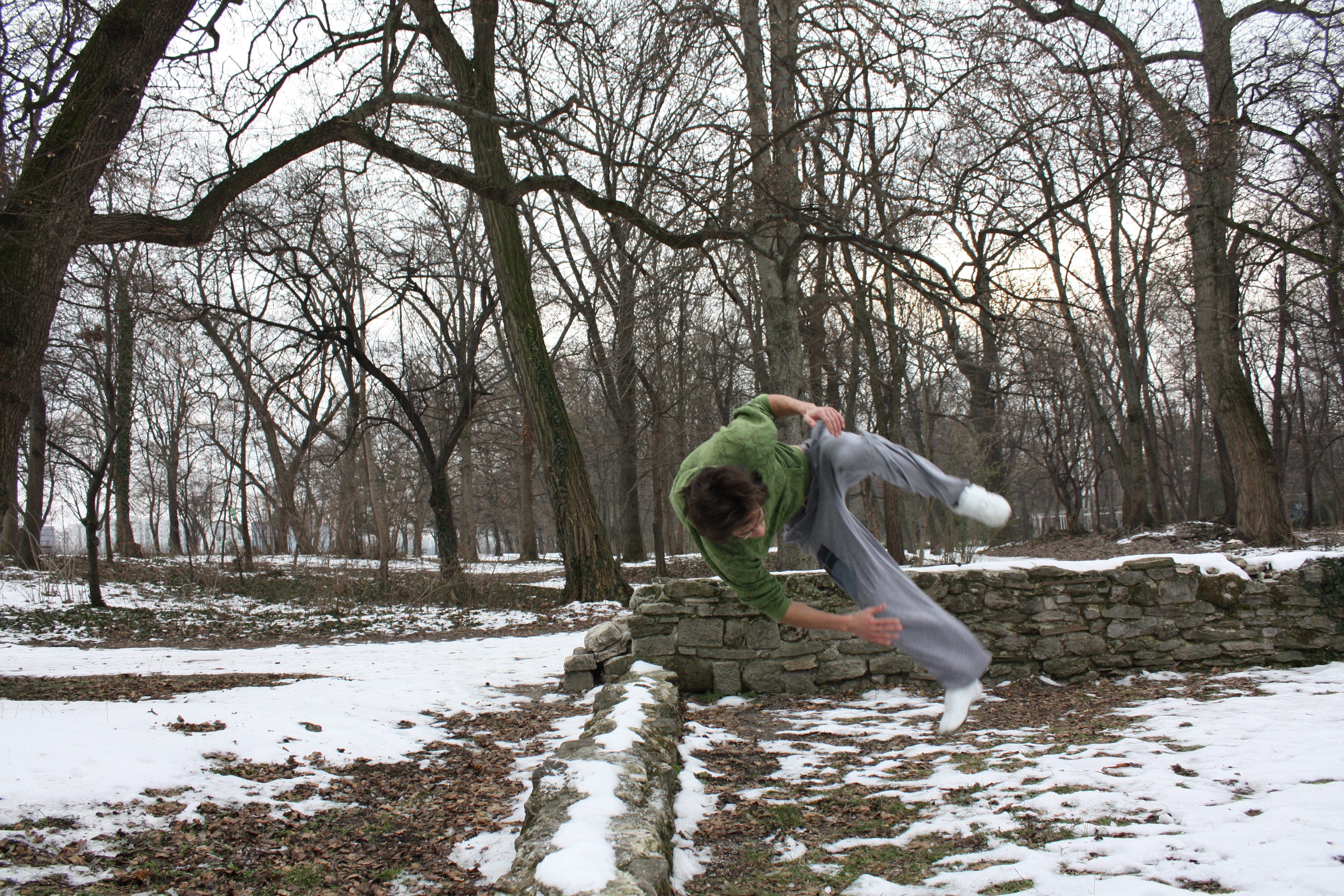 Person doing acrobatic flip