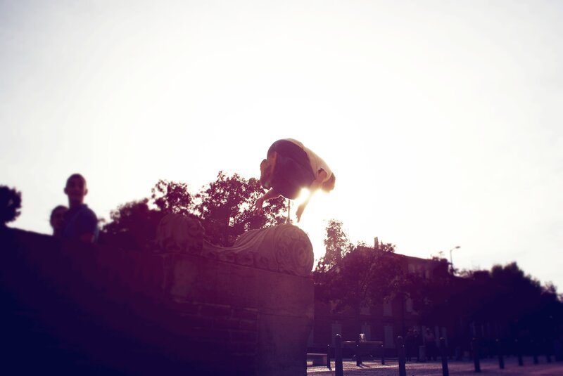 Person Doing Acrobatic Flip — White