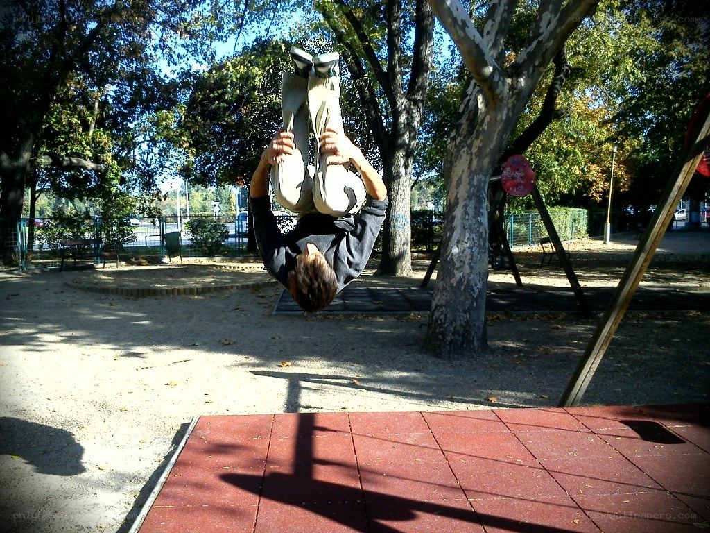 Person doing acrobatics in park