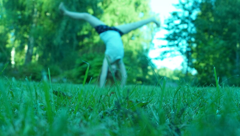 Person Doing Handstand — Green