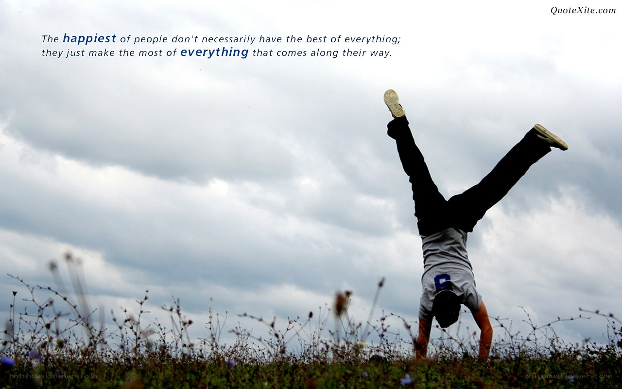 person doing handstand in field