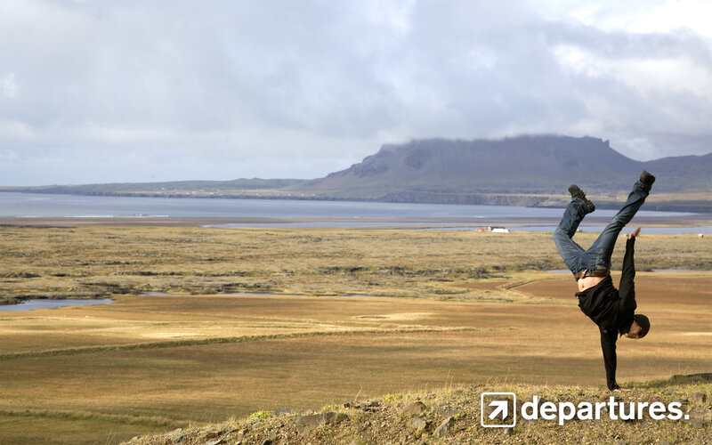 Person doing handstand in Iceland