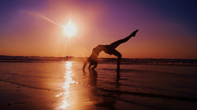 Person Doing Handstand — Purple, Dramatic