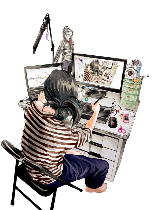 Person Drawing at Desk