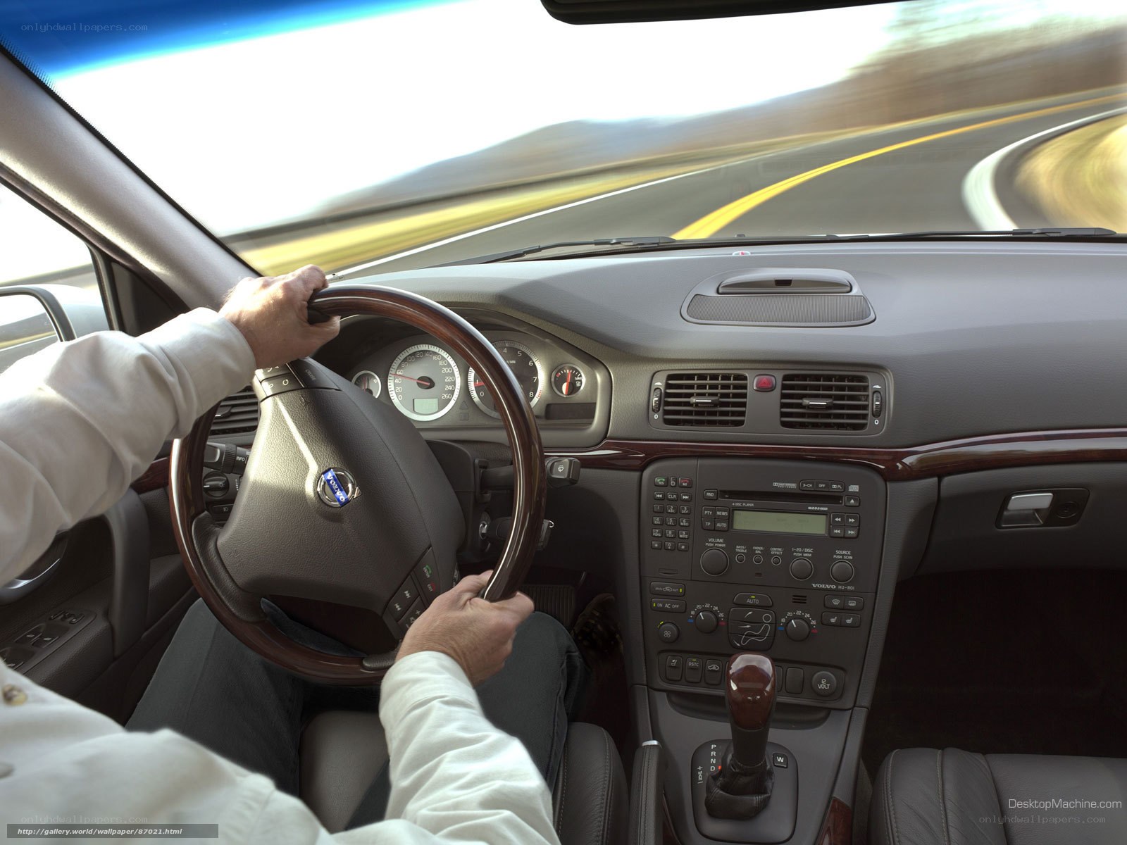 person driving volvo car