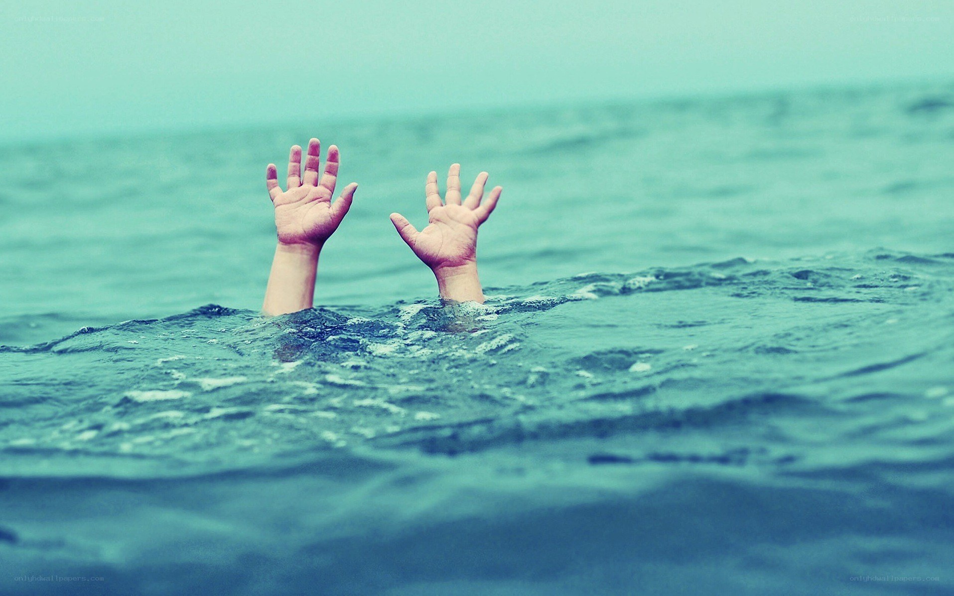 Person drowning in water