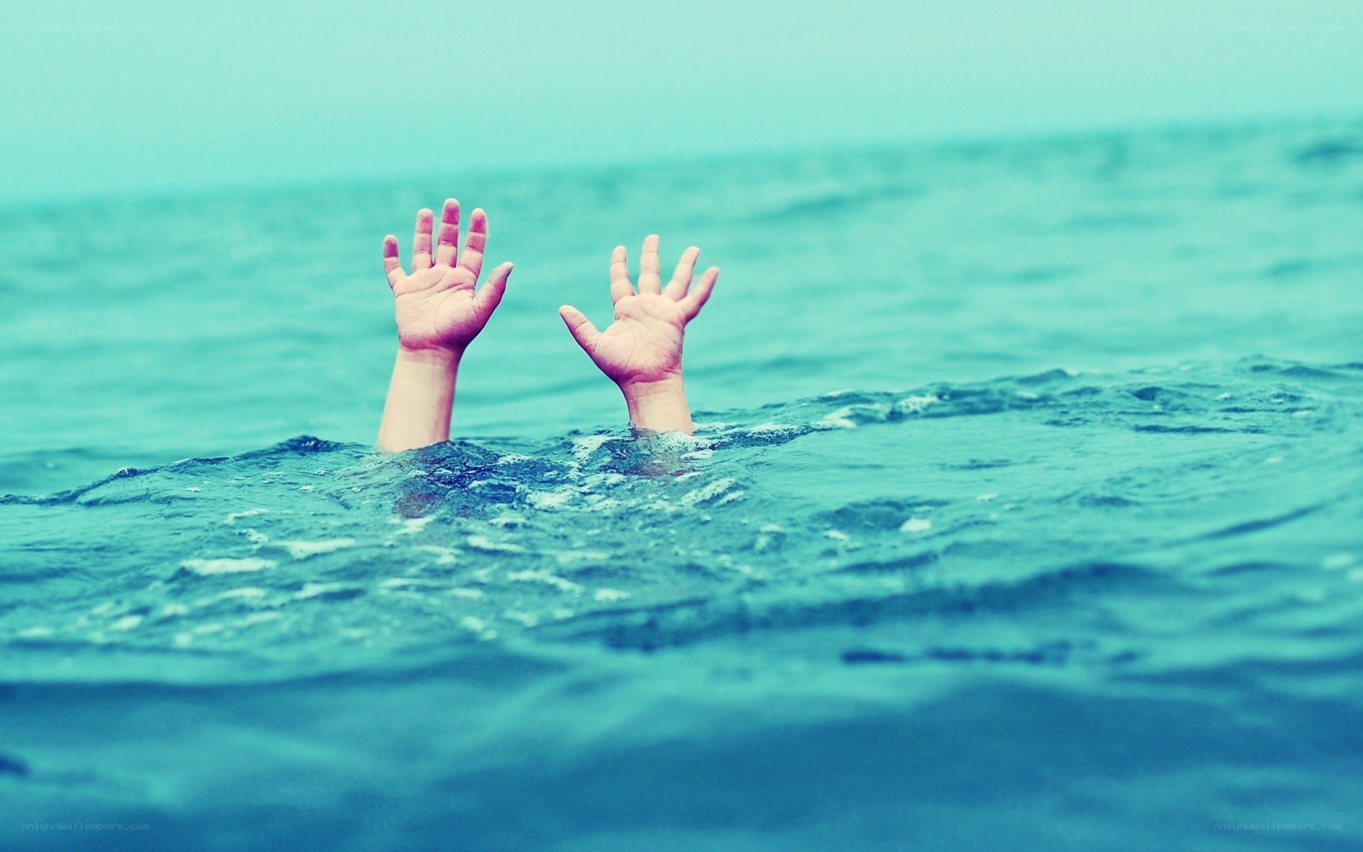 Person drowning in water