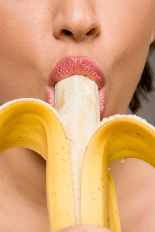 person eating a banana