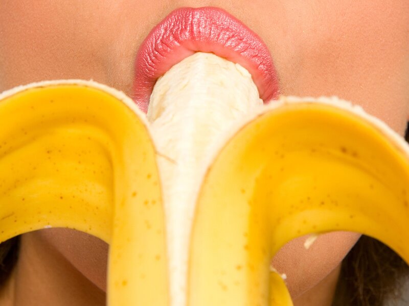 person eating a banana