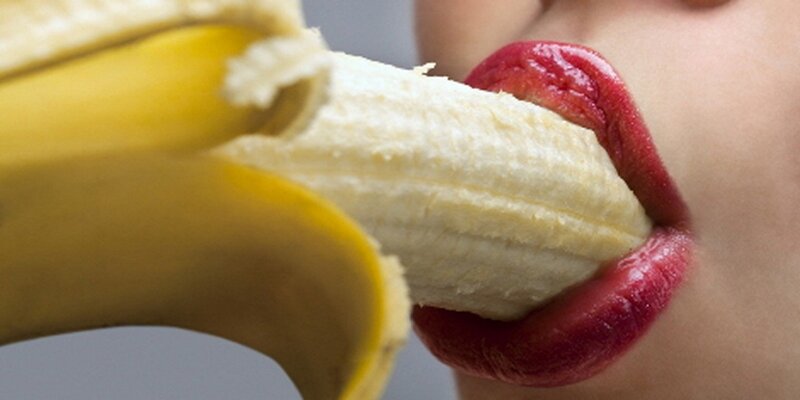 person eating a banana