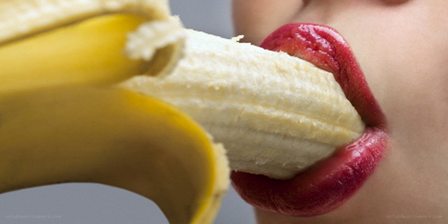 person eating a banana