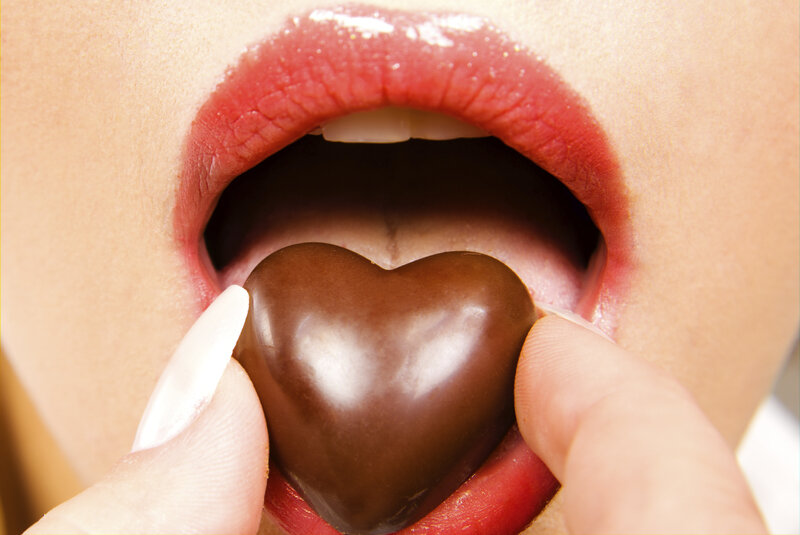 Person Eating Chocolate