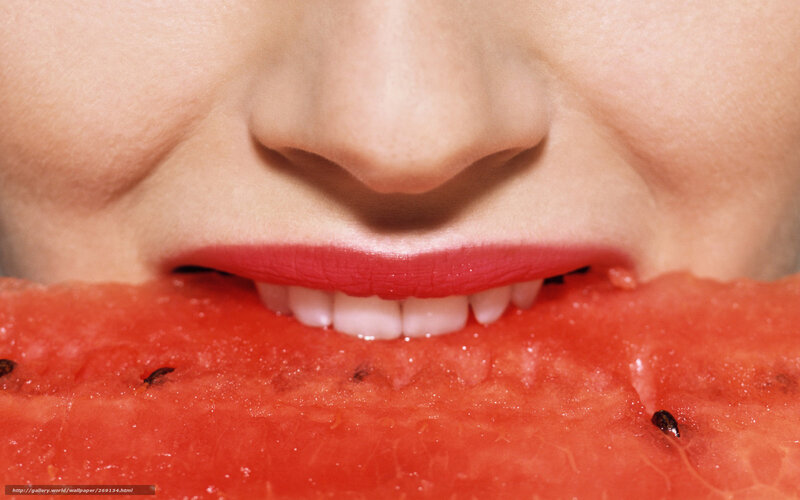 person eating watermelon slice