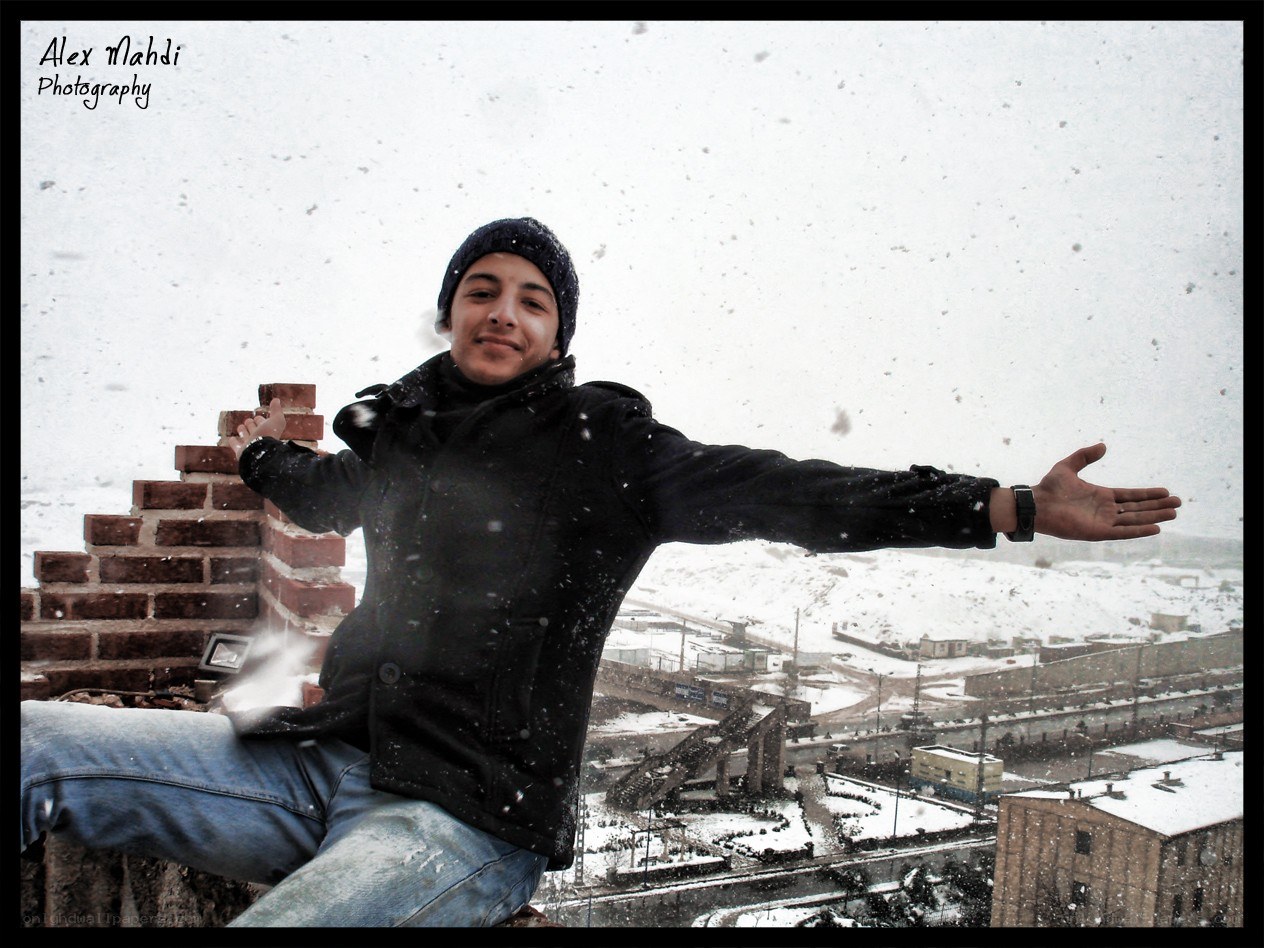 person enjoying snowfall