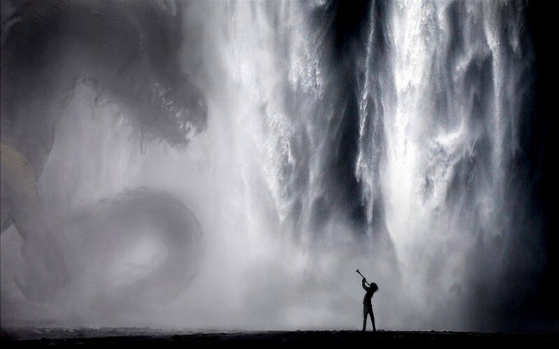 Person facing giant creature