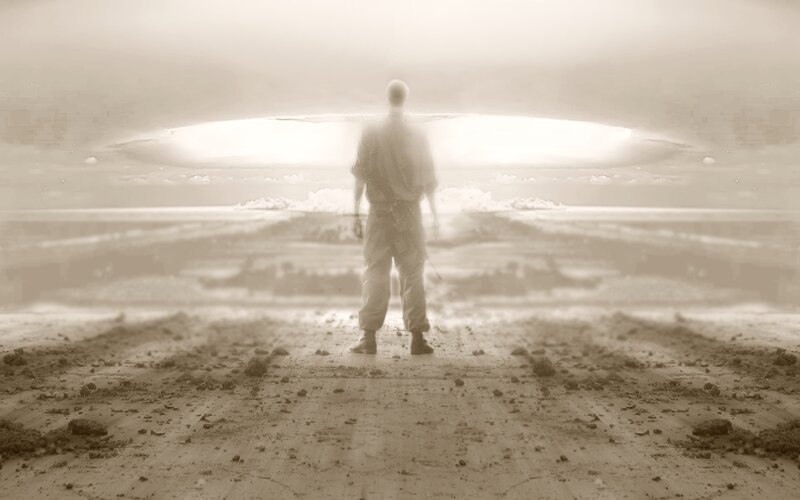 person facing nuclear explosion
