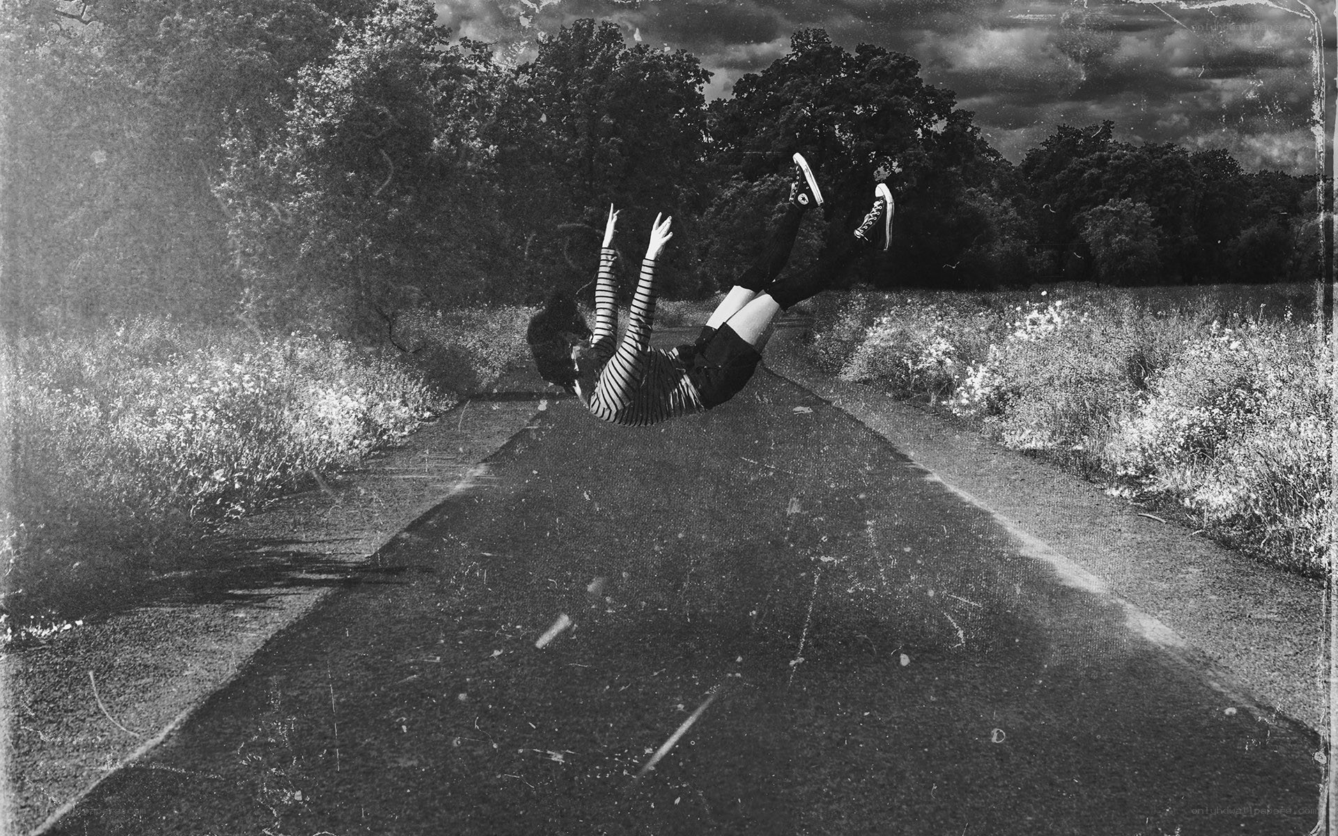 person falling in black and white