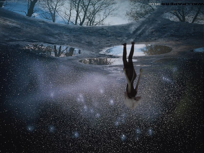 person falling into starry void