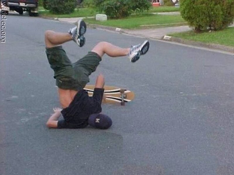 Person Falling on Skateboard