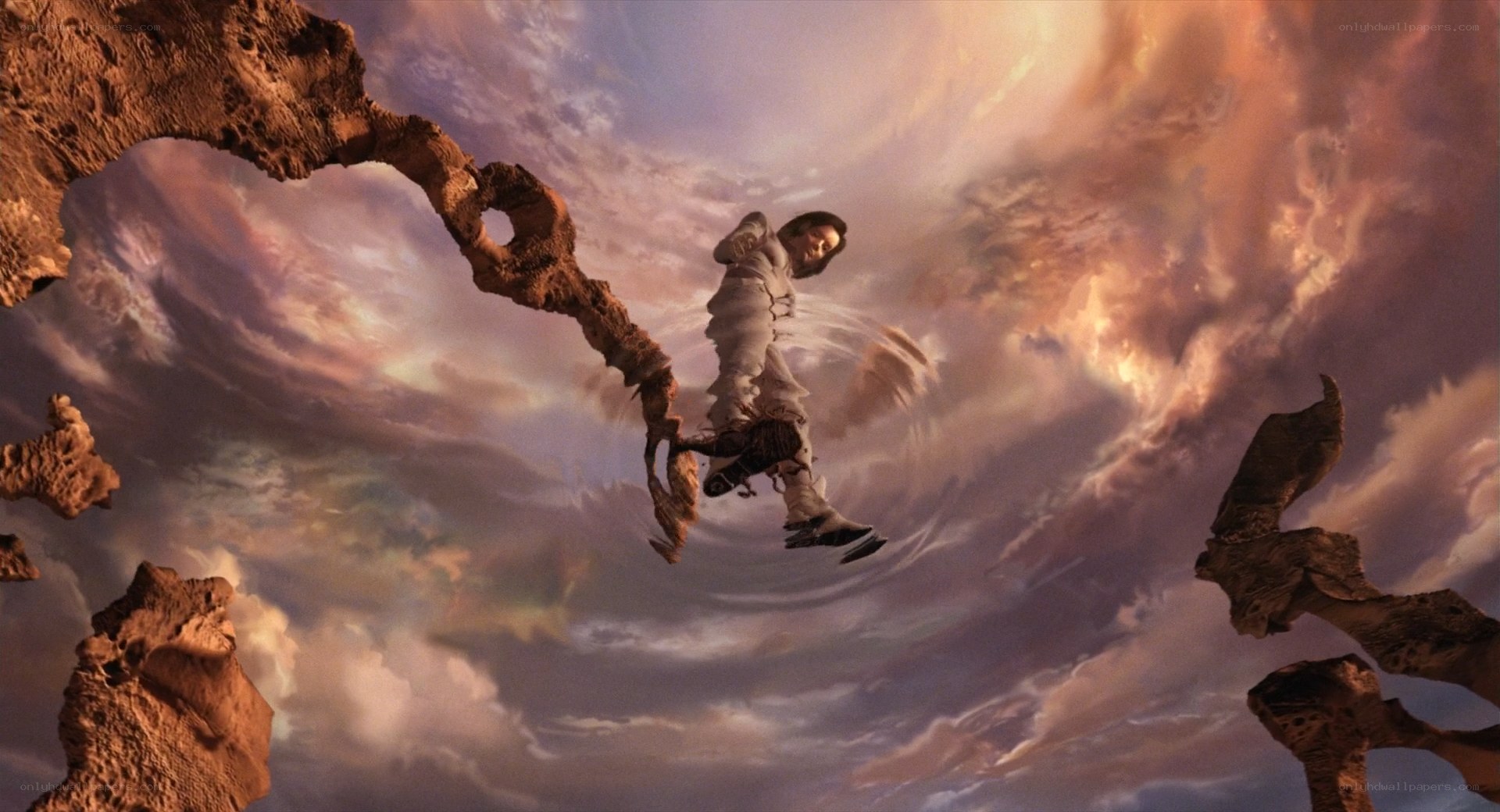 person falling through surreal landscape