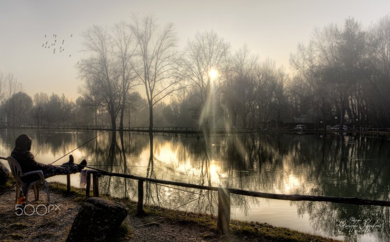 Person Fishing at Dawn — Gray